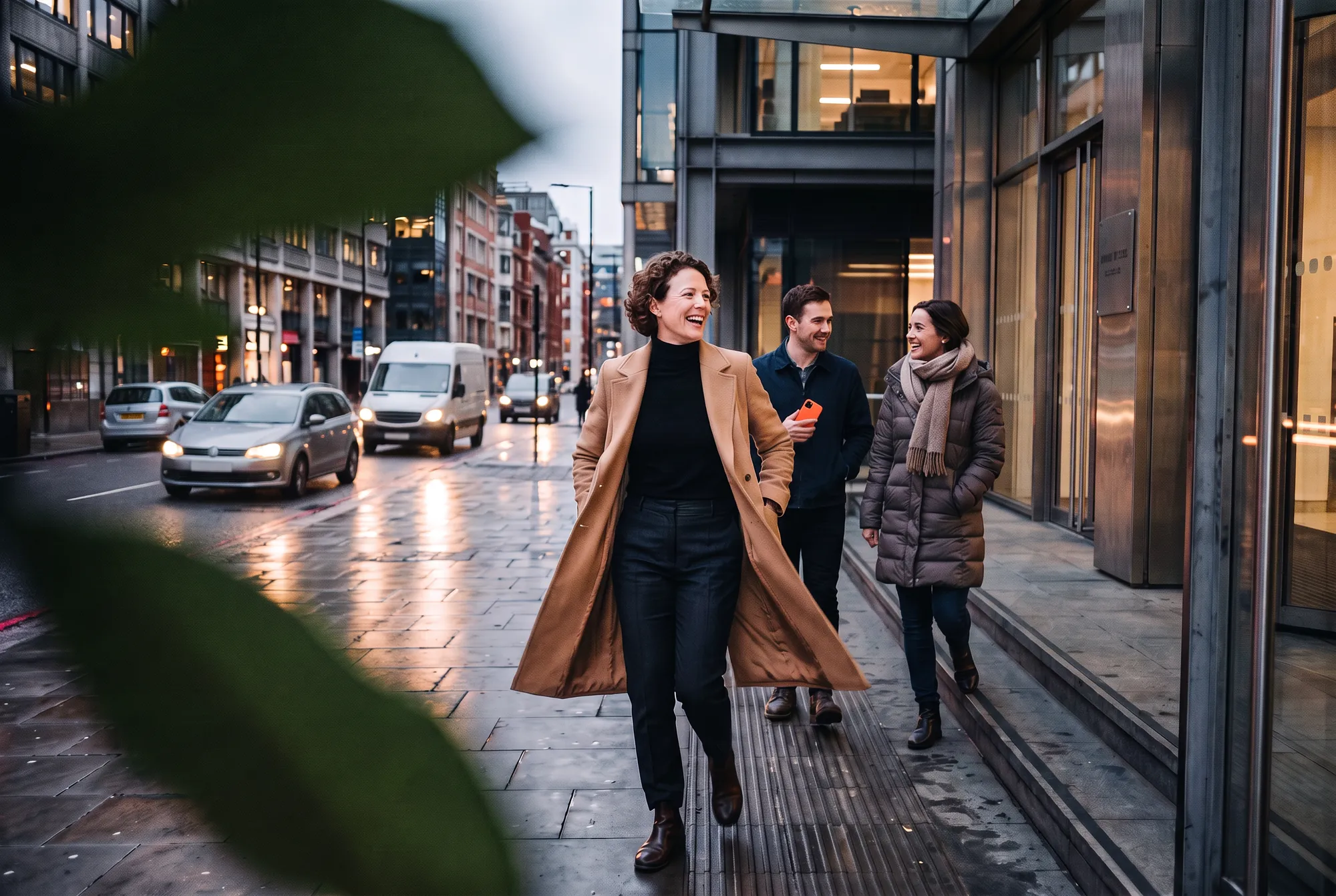 A team walking out of a London office together on completion day