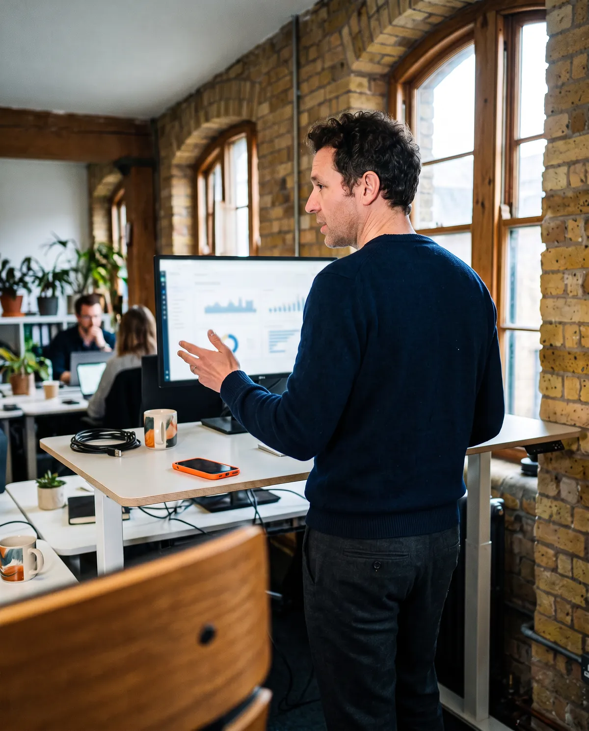 A founder at work, with value, buyer and plan indicators